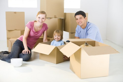 Furniture removal team handling a move in a Maida Vale apartment building