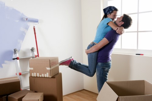 Packed boxes and furniture ready for local household relocation