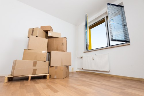 Packed moving boxes ready for a local relocation in Maida Vale