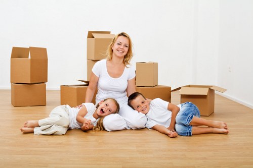 Moving boxes and furniture in a Maida Vale flat