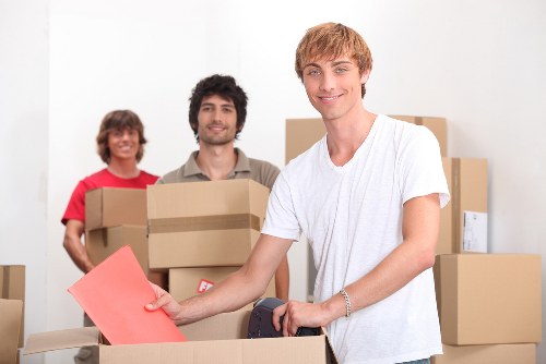 Unloading household items into a Maida Vale flat during a local move
